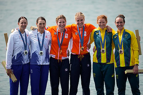 Women's pair rowing final: Romania's Roxana Anghel and Ioana Vrinceanu (Silver), Netherland's Ymkje Clevering and Veronique Meester (Gold) and Australia's Jess Morrison and Annabelle McIntyre (Bronze)